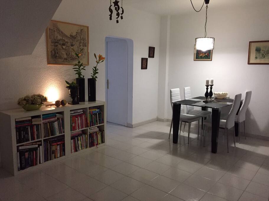 Ground floor - living room with dining area and fireplace