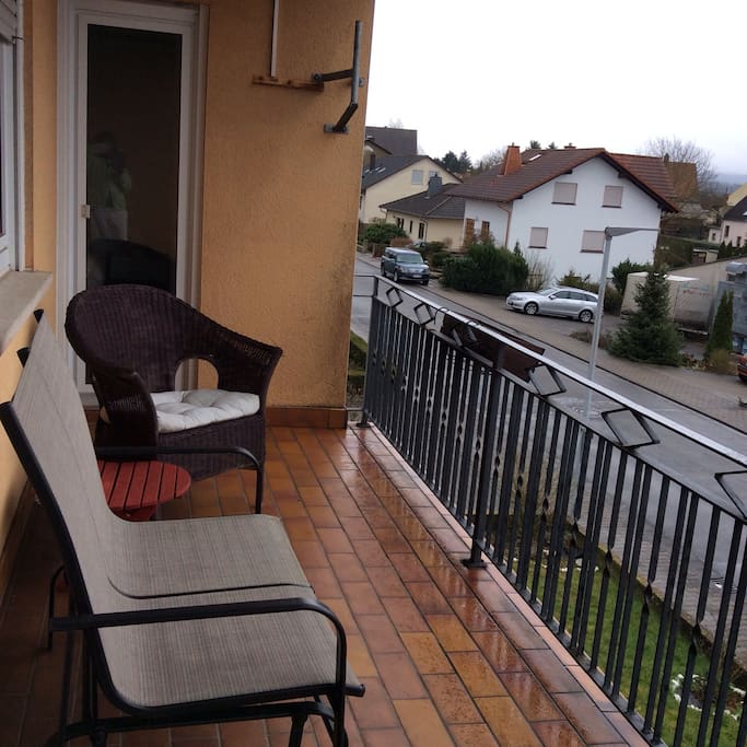 Enjoy a glass of wine on the balcony after a busy day
