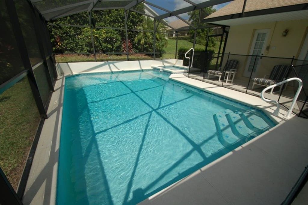 Relax and make hundreds of happy family memories together in and around this sparkling pool and sun-drenched pool deck at your Orange Tree vacation
