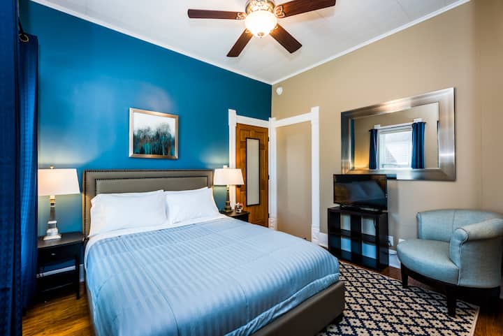 Bedroom Suite 3 - main floor with queen beauty-rest luxury plush bed, comfortable upholstered furnishings, flat panel TV/cable, WiFi and more.