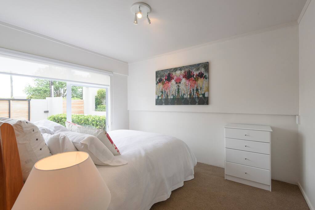 light and bright high quality fitting and linen overlooks pretty formal garden