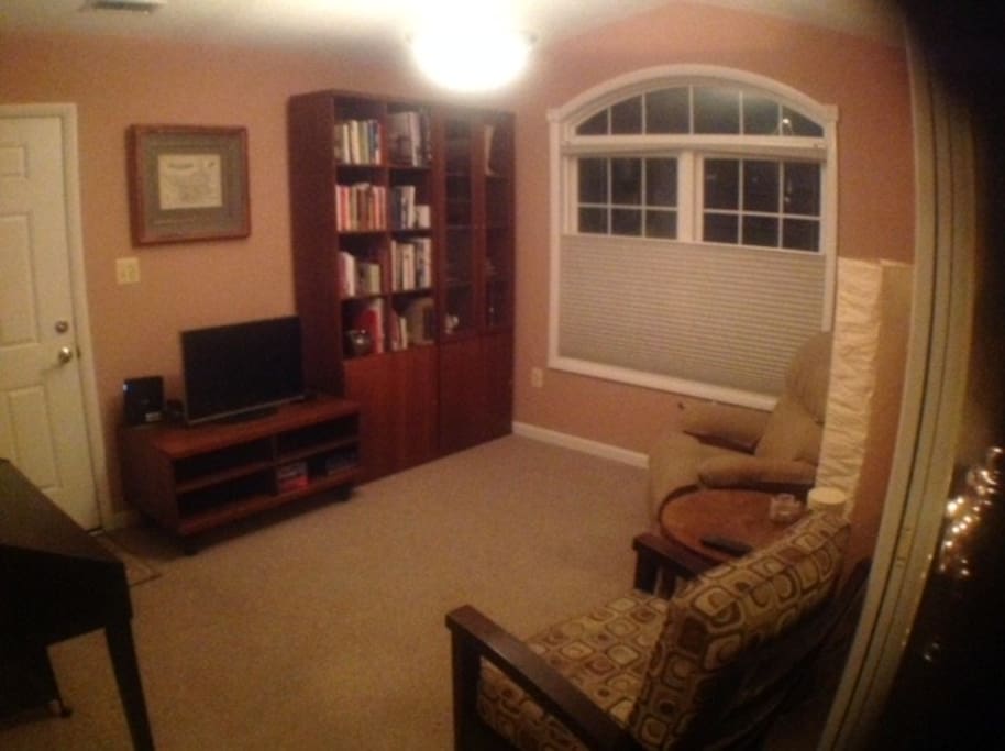 Comfy sitting room; feel free to enjoy the library, WiFi, and TV.