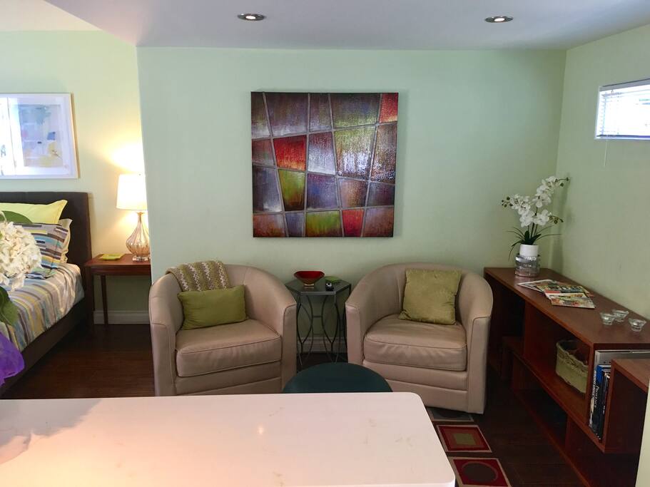 A comfortable and relaxing lounge with controllable ceiling lighting