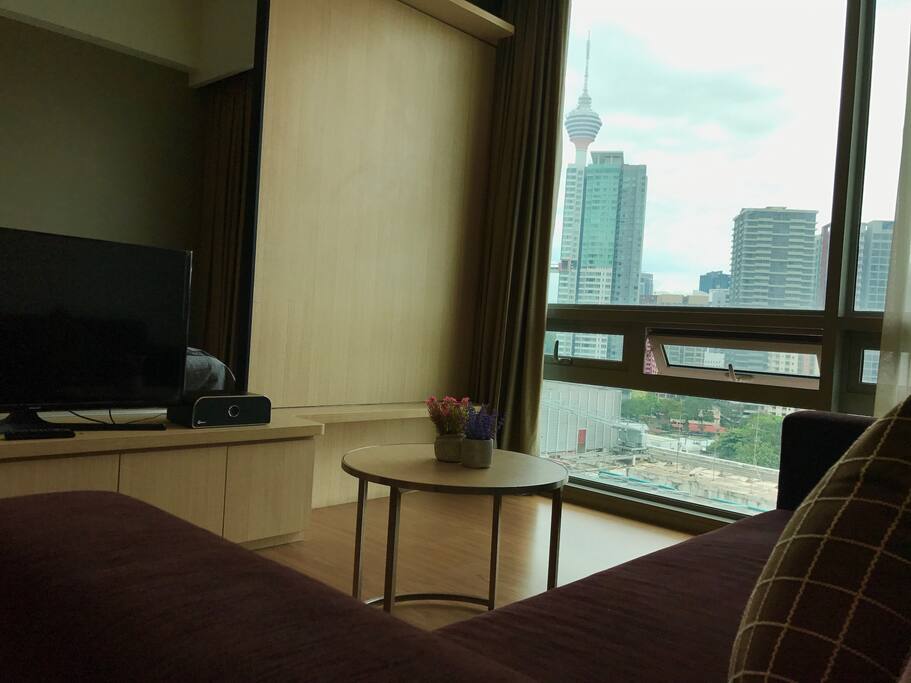 Living room with flat screen TV and luxurious sofa together mesmerising view every morning