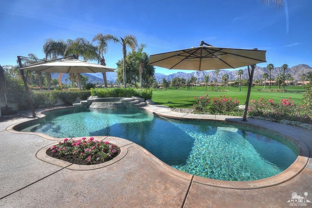 Spend countless hours lounging poolside in your private covered patio.