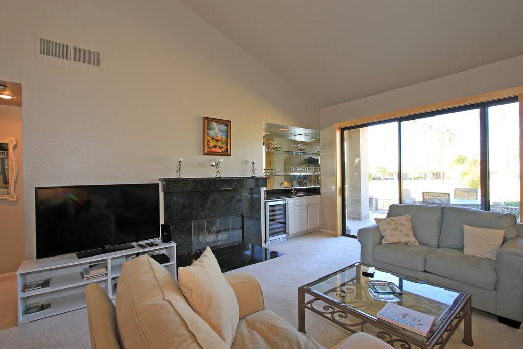 Wet bar and sliding glass doors to the back patio
