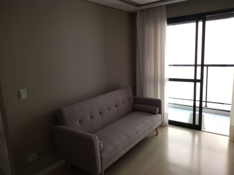 sofá-cama na sala