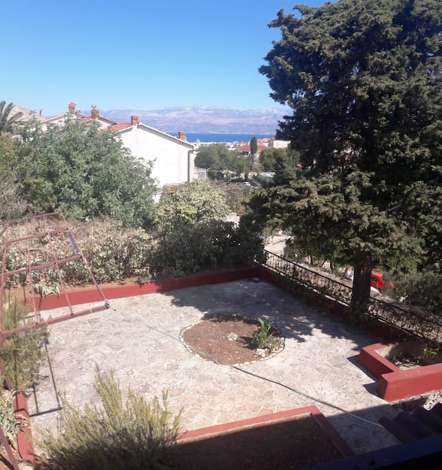View from the bedroom on the flower garden and sea with Biokovo mountain.