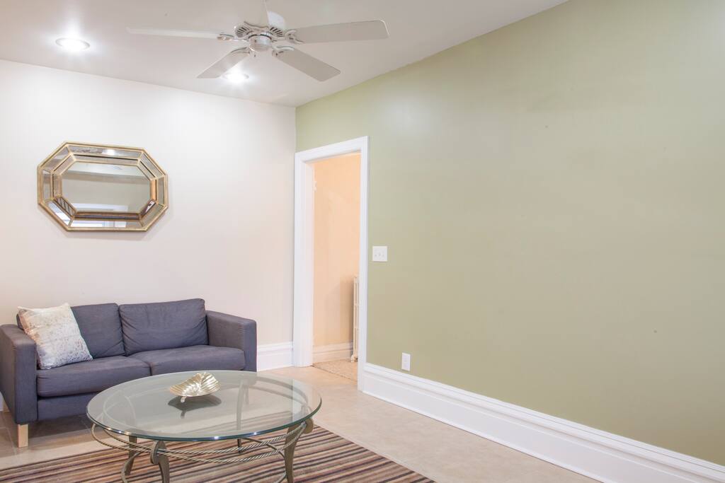 Very comfortable space. Porcelain tile floor with area rug
