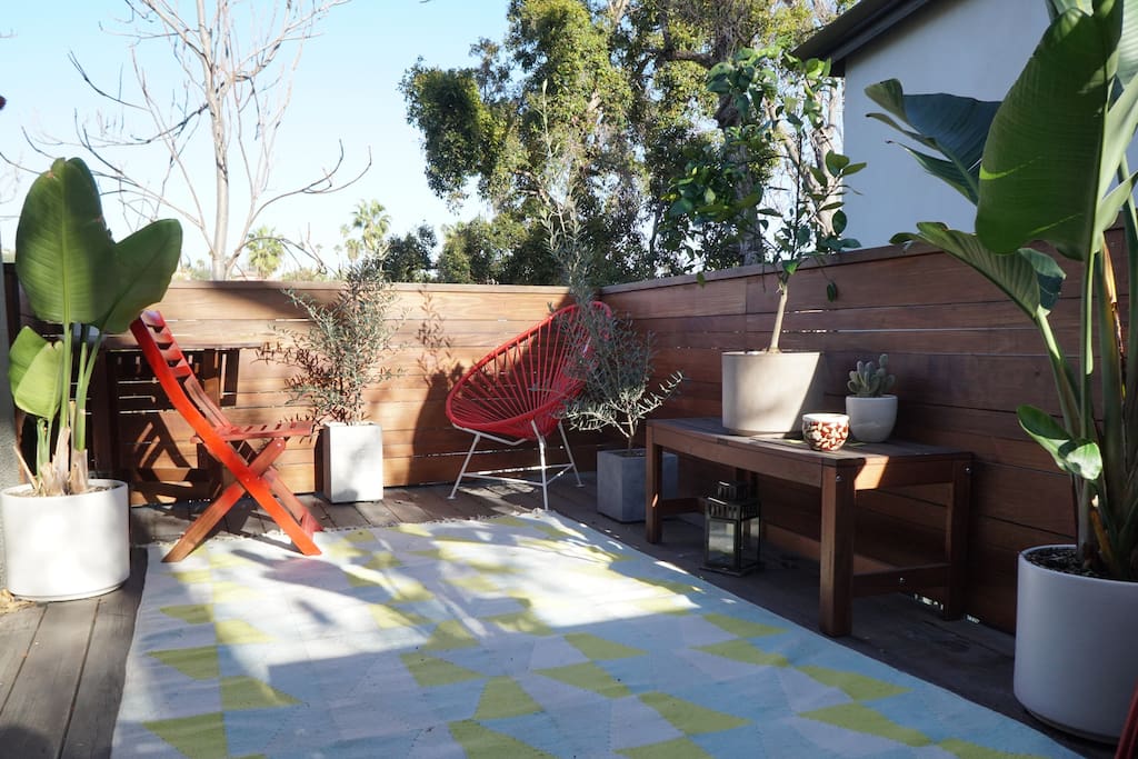 The upstairs deck, complete with seating area and views