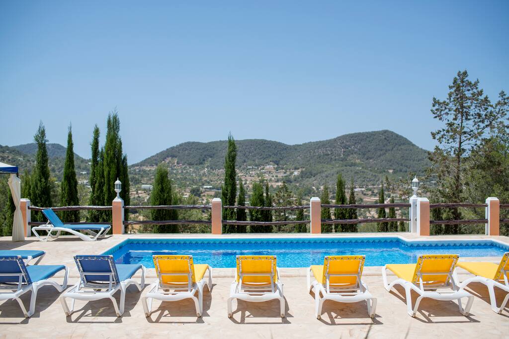sun beds by the pool