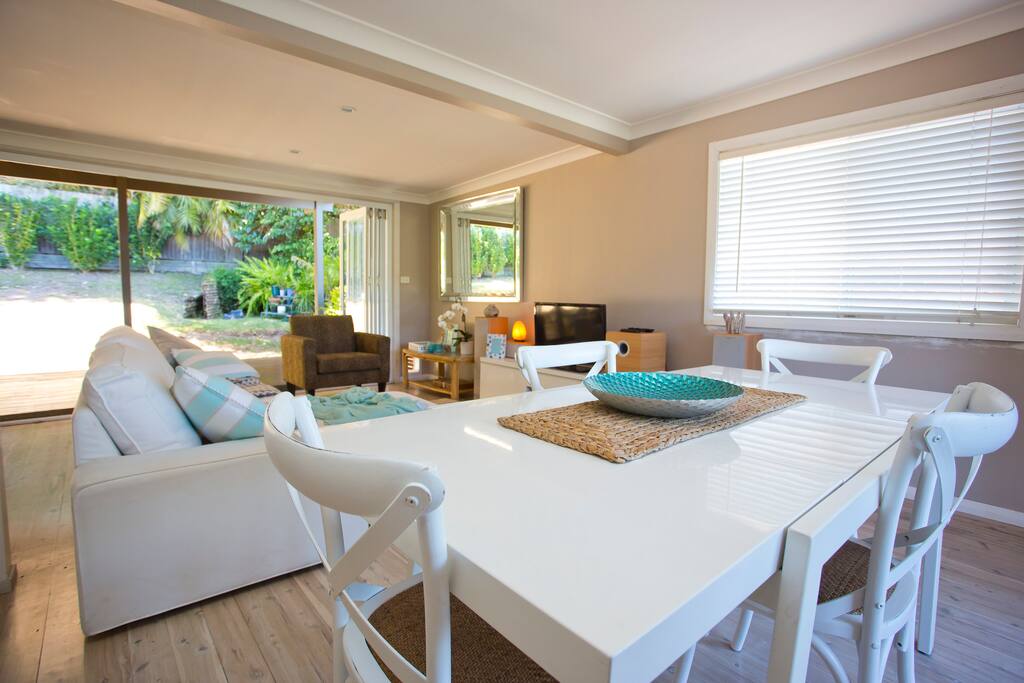 Upstairs dining and lounge with outdoor covered deck.
