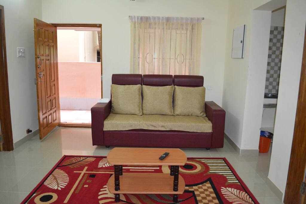 FLAT 1 -hall with a cosy sofa