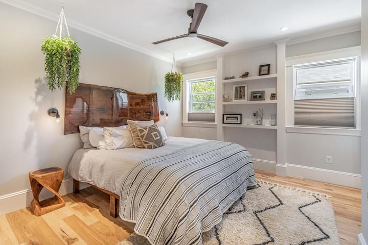 master bedroom with king bed and ensuite bathroom