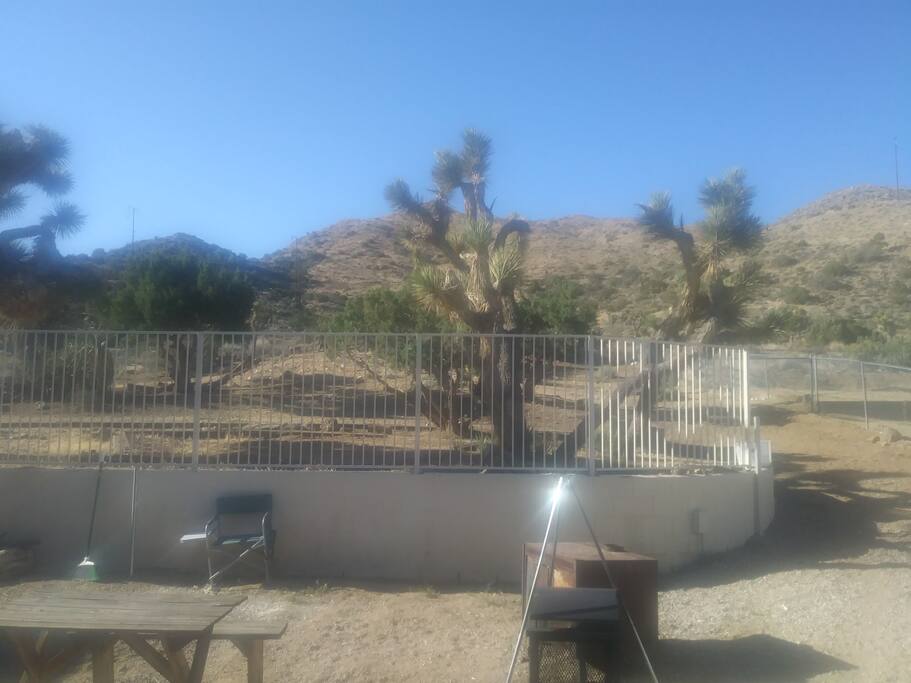 back yard with mountain hiking.