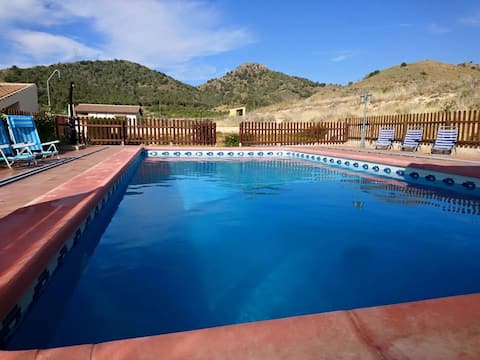 Houses with pool, spa, playground and farm.