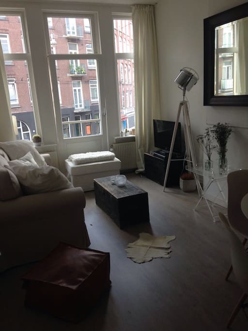 Living room with a view and a door to the French balcony
