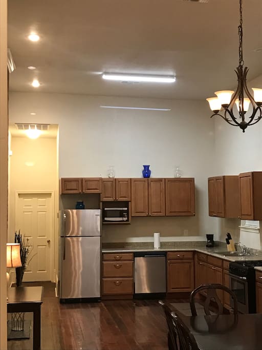 Full size kitchen: Gas Stove, Refrigerator, microwave, coffee pot and dishwasher