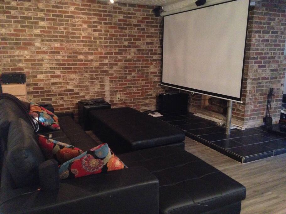 Movie theatre set up with surround sound.