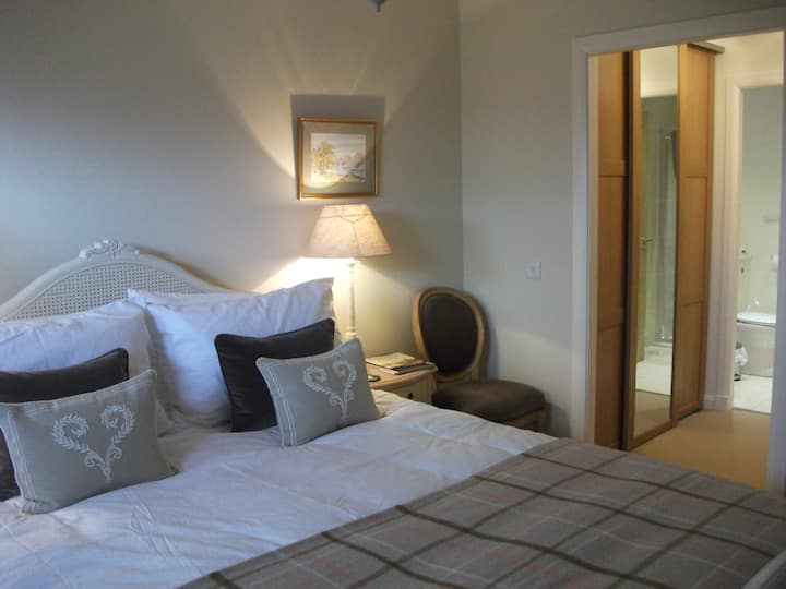 Double bedroom with dressing area and en-suite.  King size bed with luxury mattress topper.