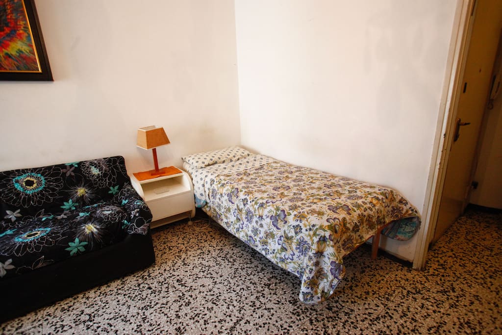 letto a 1 piazza marca Dorsal con doghe in legno