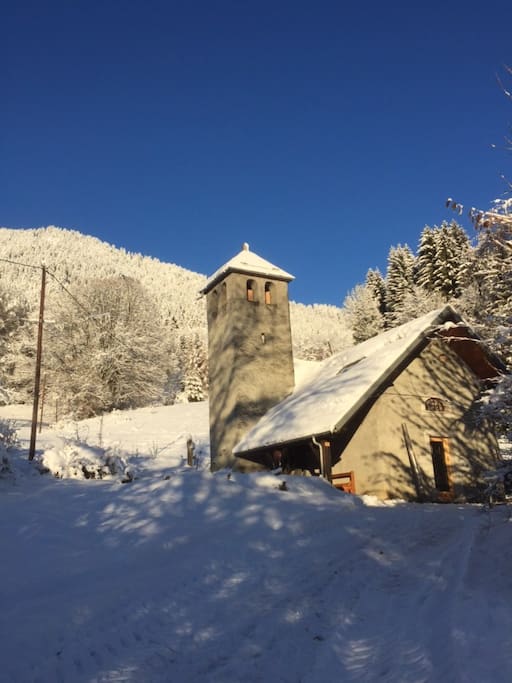 The chapel covered in snow