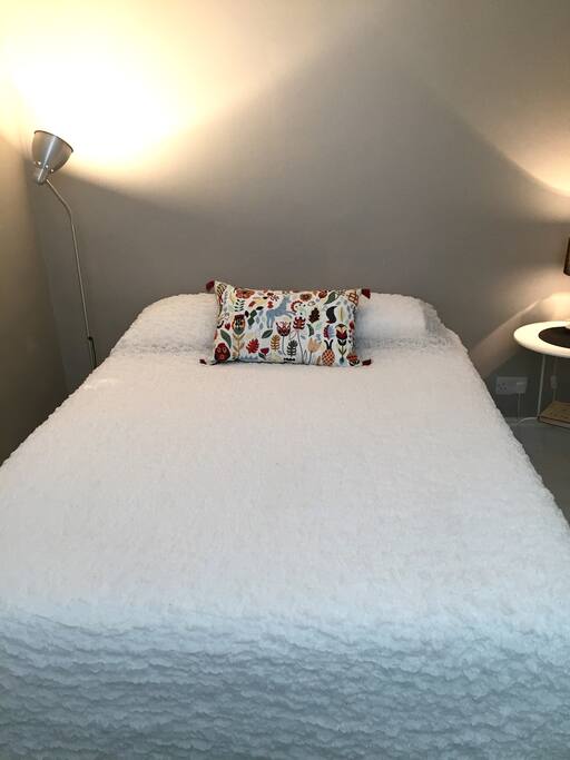 A very comfortable king size bed for a good night's sleep