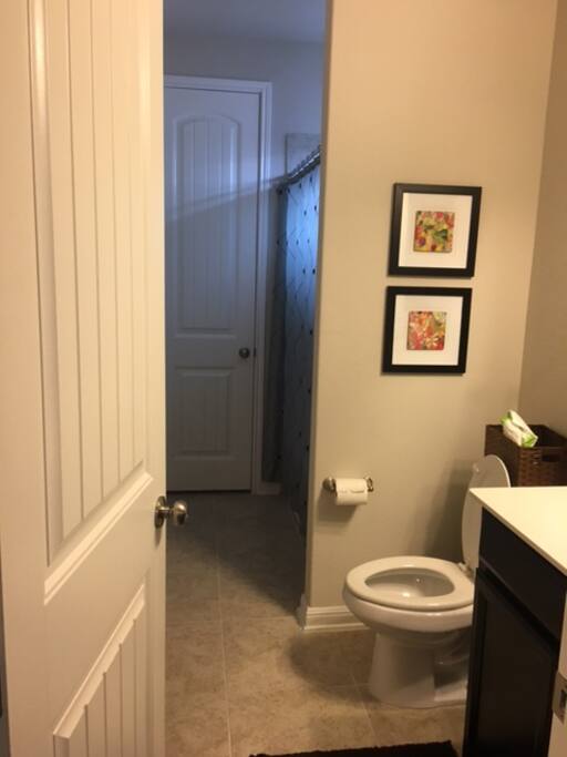 Private bathroom with walk in closet