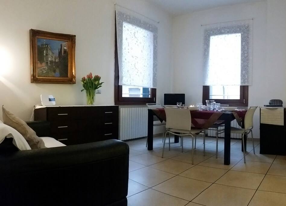 The living space and the dining room.