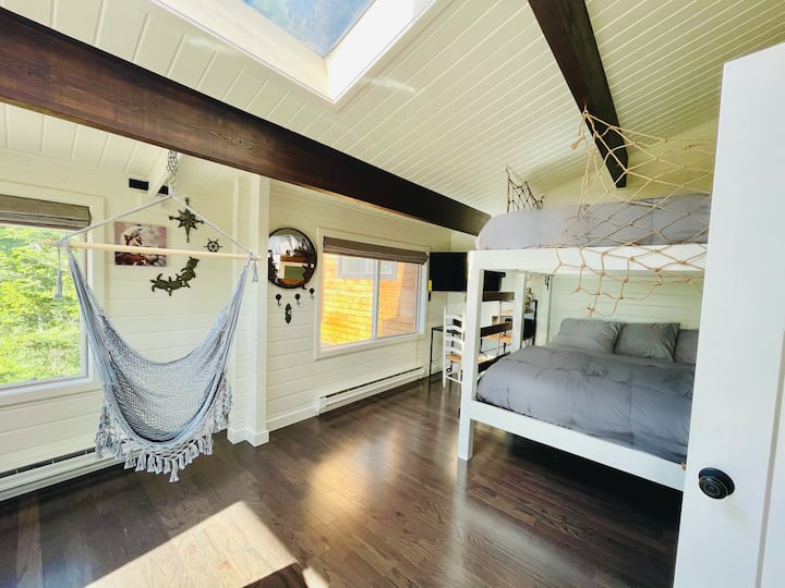 The mermaid room. With king over king bunk beds, and swinging chairs!