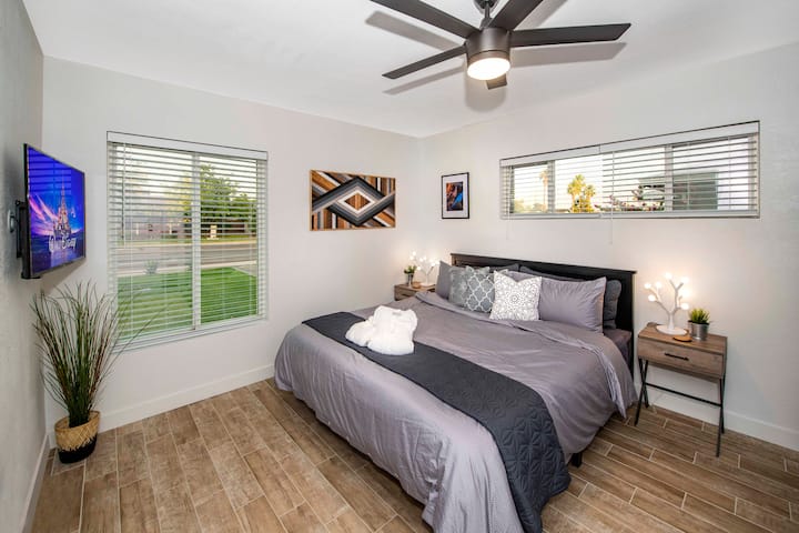 Third bedroom with king bed and 4K smart TV.
