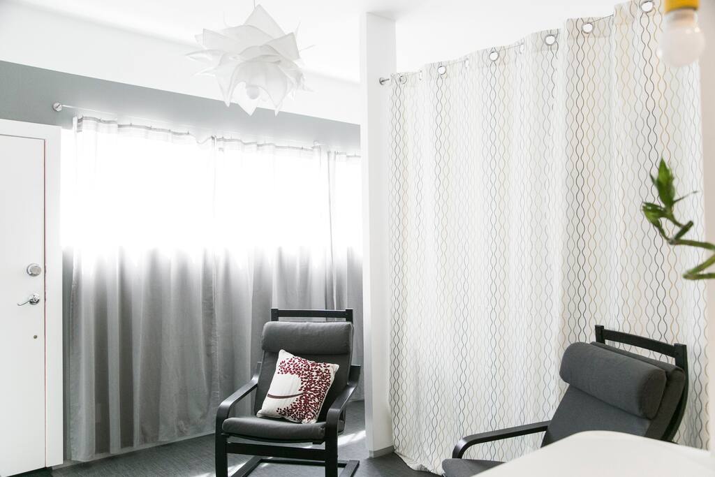 Separated by a courtain is the comfortable bedroom area