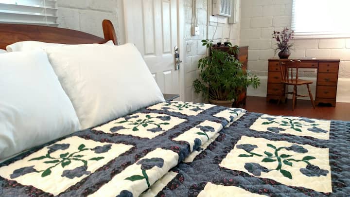 Turned down for you to enjoy! Our quilts are washed after each guest, along with the linens, so you can feel free to snuggle up.