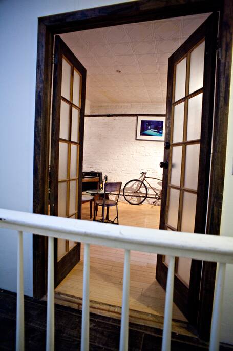 double french doors open to the common area