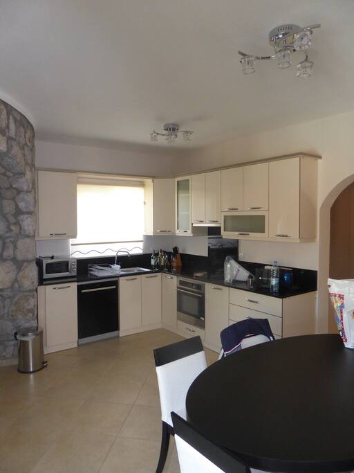 Kitchen and dining area for main part of bungalow.