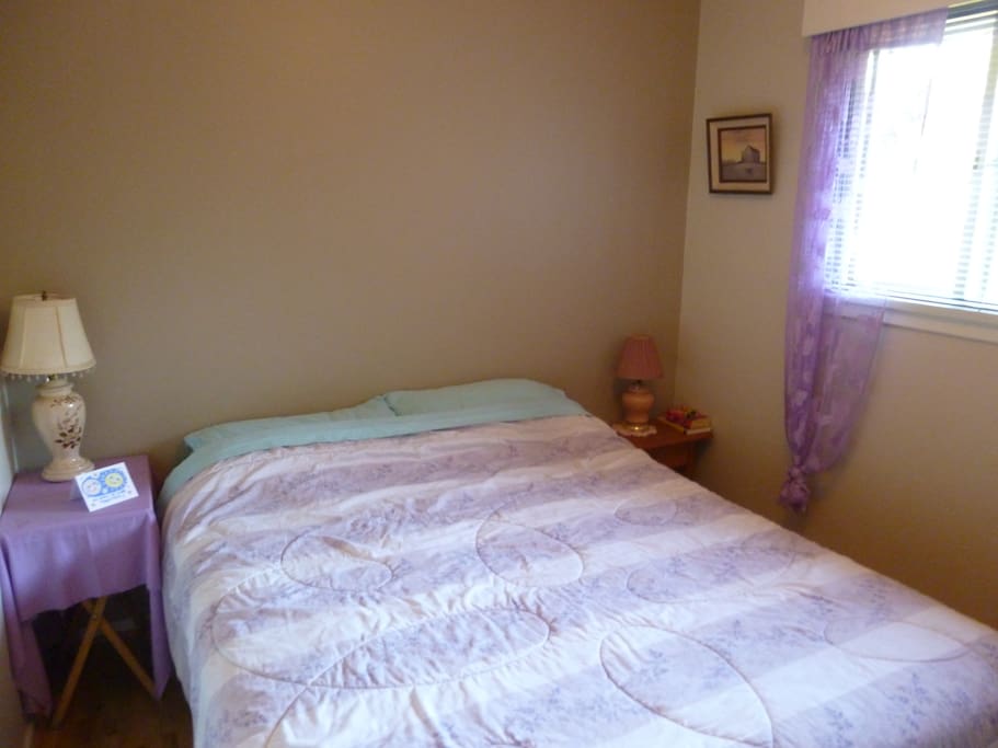 The bedroom - comfy double, with extra blankets and closet space