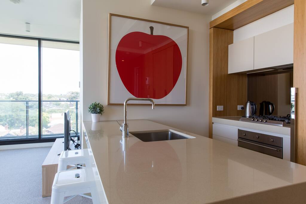 Well appointed kitchen Smeg appliances including oven, gas cook top and dishwasher