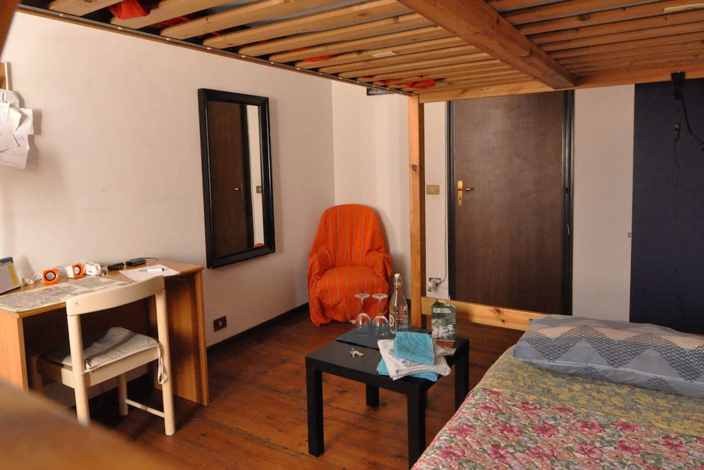 The bedroom with a double bunk bed and a single bed underneath