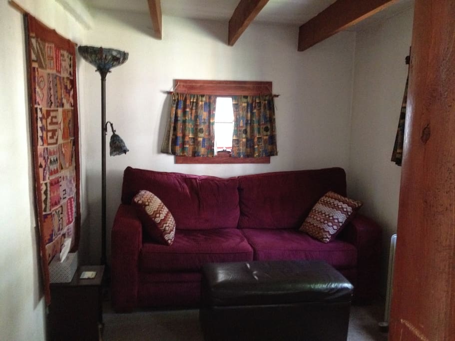 Comfortable Queen sized foldout with memory foam mattress cover