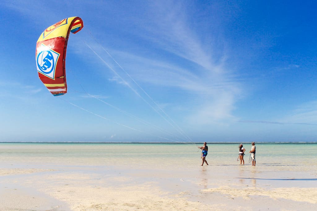 Kite lessons, rental and free ride at my beach club.