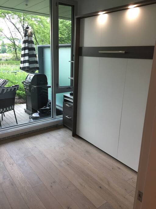 2ND BEDROOM/OFFICE WITH BESTAR QUEEN PULL DOWN BED.
50 INCH TV WITH CABLE AND NETFLIX.