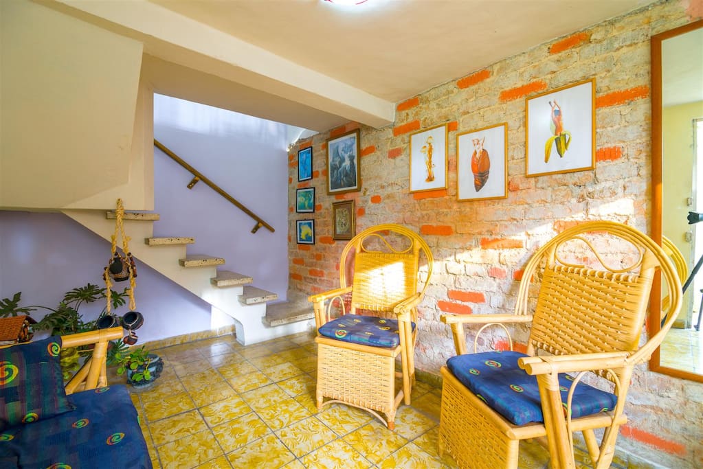 living room, at the background the stair to the second level bedroom