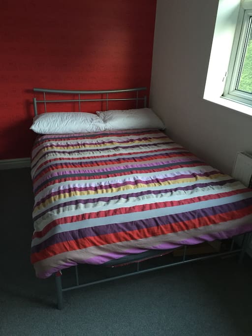 Double bed and bunk beds available in this room.