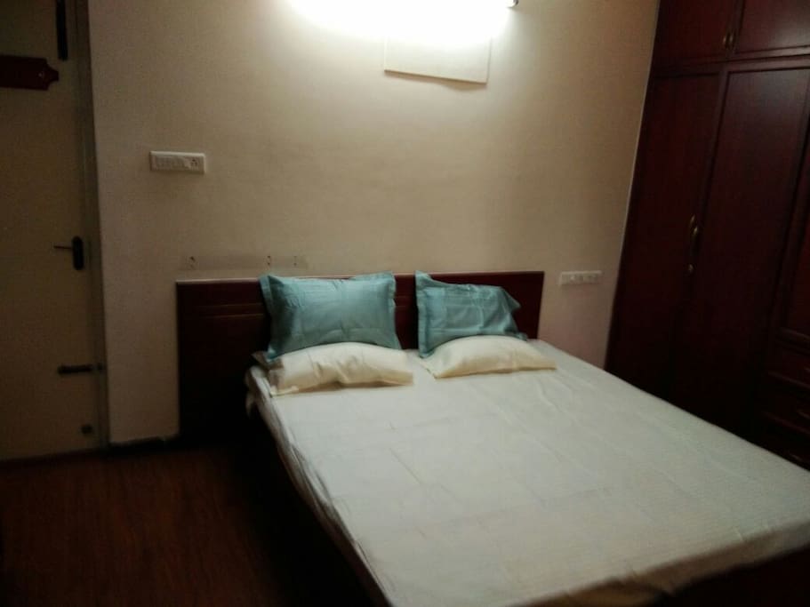 Master Bedroom. With wooden flooring and complete wardrobe