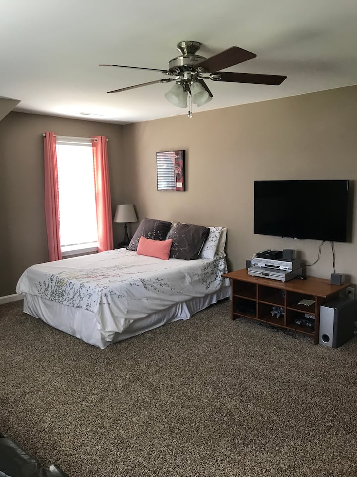 Bedroom 3-Queen temperpedic bed. Couch, TV. 