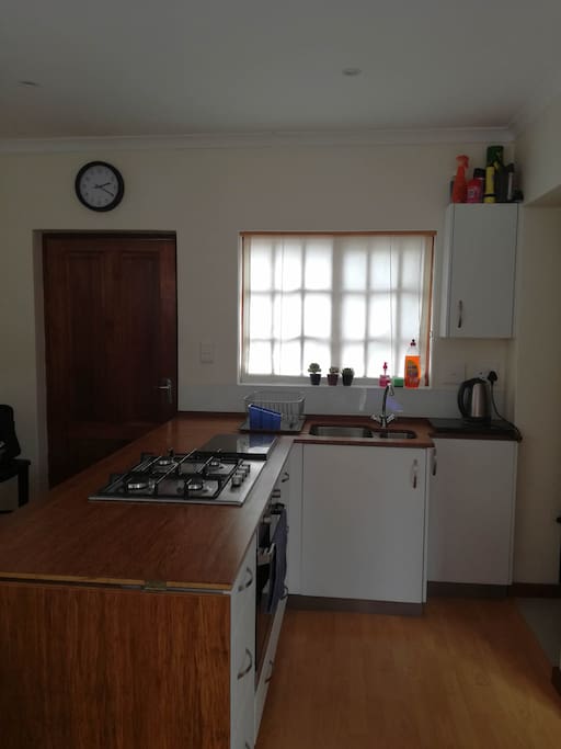 Fully fitted kitchen - electric hob and gas stove top