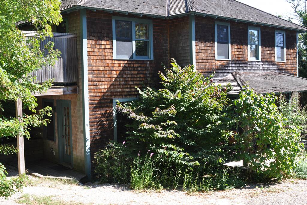 Private entrance (on left of photo). You can enter on either the upper or lower level of the apartment.