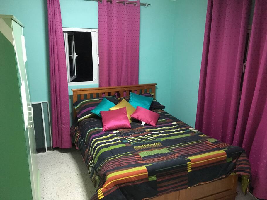 This is bed room # 2 which contains the following.
1: queen bed.
1: closet.
1: Airconditioner.
1: laugage crip.