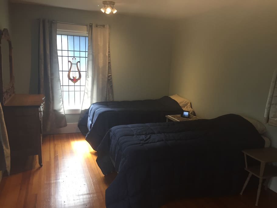 Bedroom 1: great for kids features two single beds and a futon and a TV with streaming services Hulu and Netflix