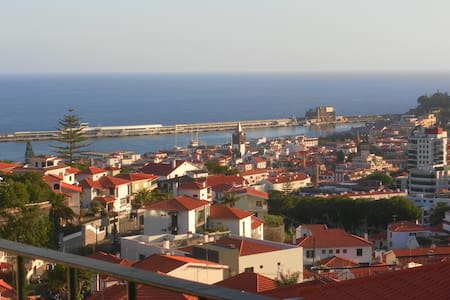 Private room with balcony and sea view in Funchal